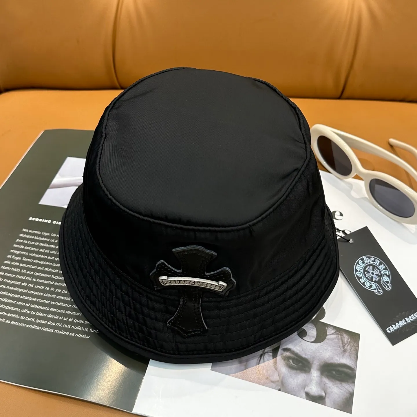 P70 Chrome Hearts CH Crank Bait Navy leather cross fisherman hat, same style for men and women. Custom-woven and dyed navy blue and yellow nylon fabrics, hand-cut imported colorless yellow crosses, and 925 silver scrolls.
